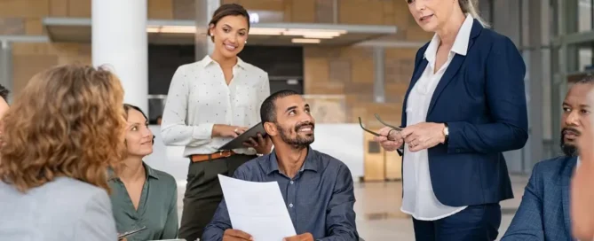 Fractional C-suite executives collaborating with a business leadership team to provide strategic guidance, executive expertise, and sustainable business growth.